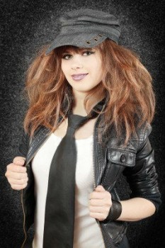 Young girl in a leather wear