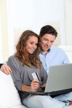 9002136-couple-at-home-doing-online-shopping